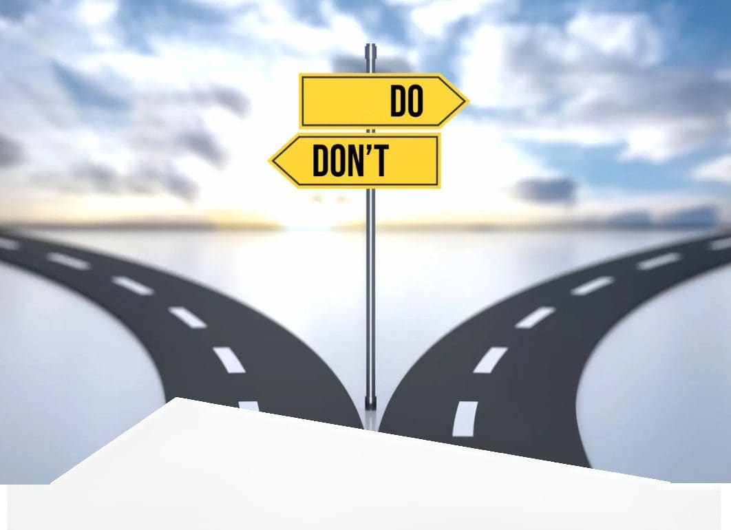 A signpost with arrows labeled 'DO' and 'DON'T' at a fork in the road.